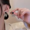 Korean Style Black Bow Earrings - Image 3